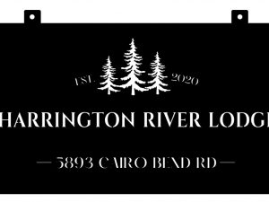 Harrington River Lodge sign in black metal