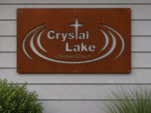 Crystal Lake church sign in auburn patina
