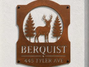 Metal Buck evergreen sign