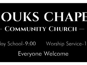 Houks Chapel sign in black with white backer and straps for mounting