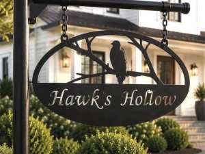 Metal Sign with hawks sitting on branch customized with your name