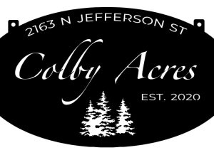 Colby Acres sign in black
